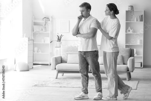 Young woman supporting sad ...