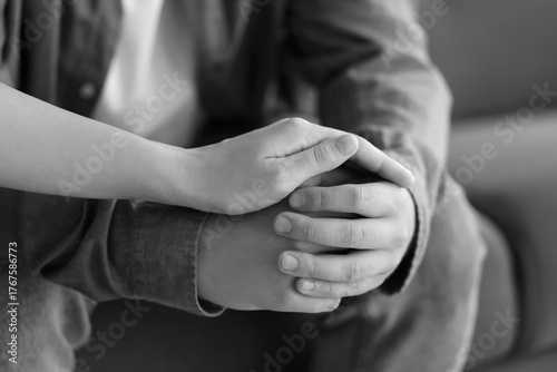 Supportive hand holding emp...