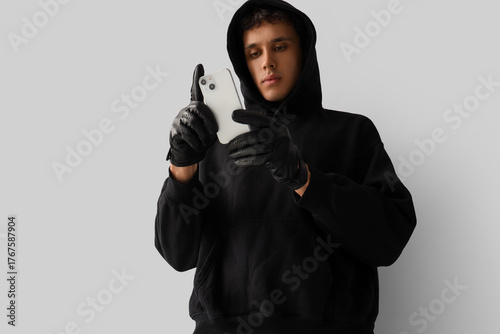 Male fraudster with mobile ...