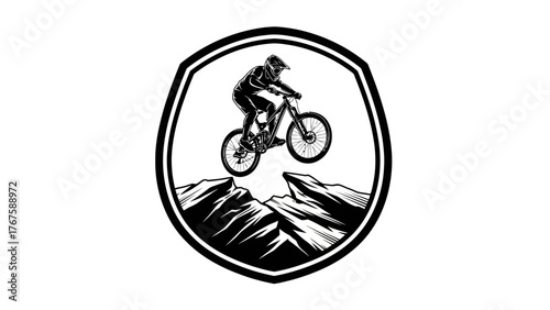 Black and white graphic of a mountain biker mid-air inside a shield, over a rocky mountain
