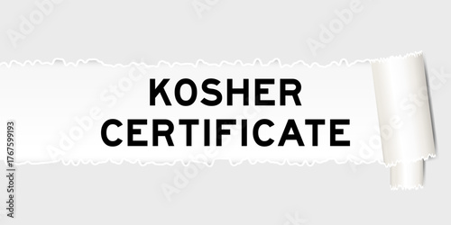 Ripped gray paper background that have word kosher certificate under torn part