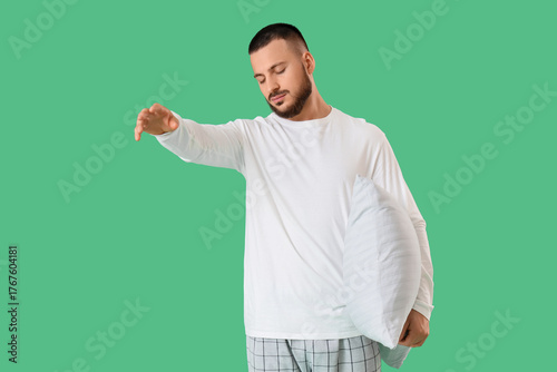 Male sleepwalker in pajamas...