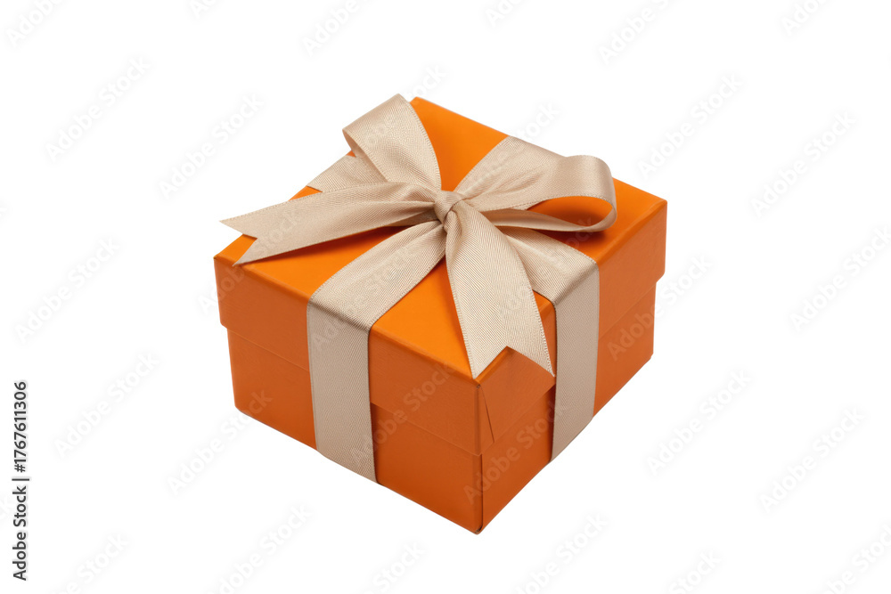 Fototapeta premium A vibrant orange gift box, elegantly tied with a delicate beige ribbon and bow, presented on a clean transparent background. background removed