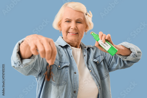 Senior woman with cockroach...