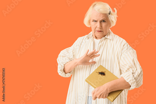 Senior woman with book and ...