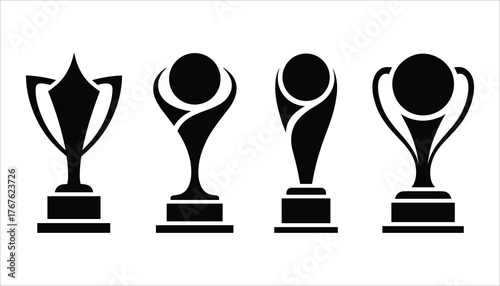 Four black trophy cup icons on white background award winner