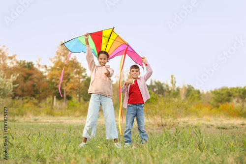 Cute children with kite sho...