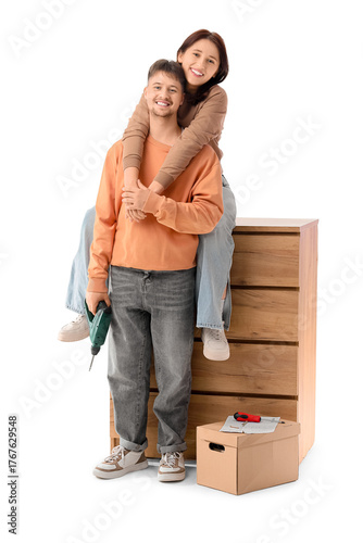 Young couple assembling che...