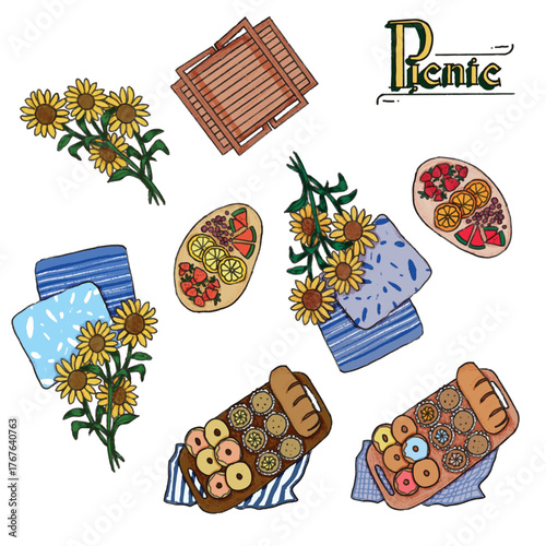 A set of picnic food, flowers and equipment 