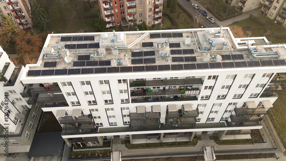 Fototapeta premium Aerial view residential building with solar panels
