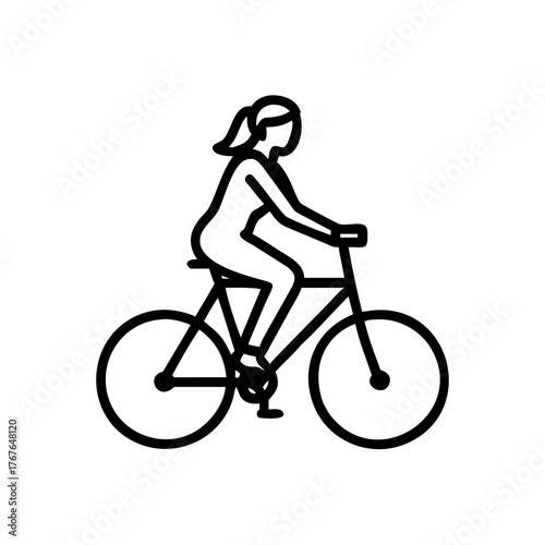 Young woman commuting to work on a bicycle in the city