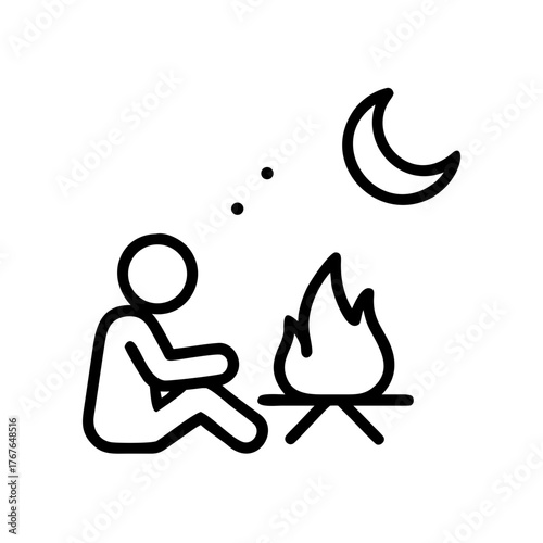 Person sitting by campfire under the starry night sky