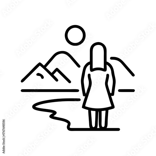 Woman admiring the reflection of mountains on a river