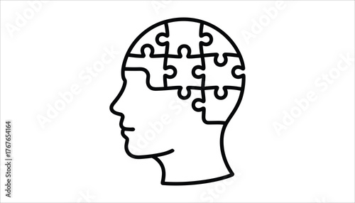 Black and white line drawing of a human head profile with puzzle pieces inside silhouette outline