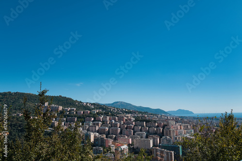 skyscrapers of Genoa in Italy under a blue sky