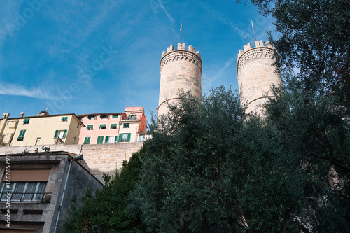 Porta Soprana in Genoa with olive tree and blue sky