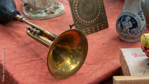 Eclectic collection of vintage antiques on market table