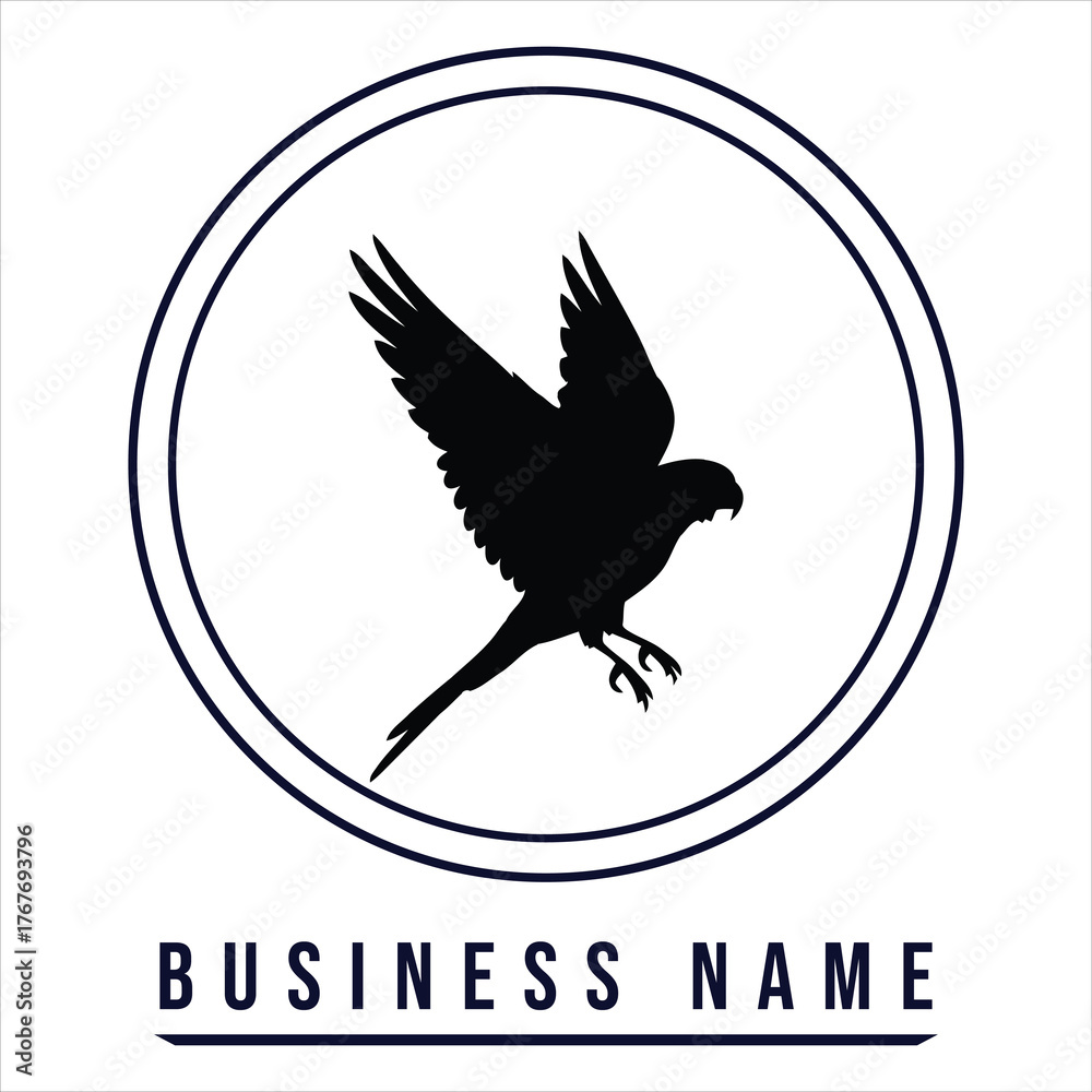 Fototapeta premium Black bird silhouette flying inside circle falcon hawk