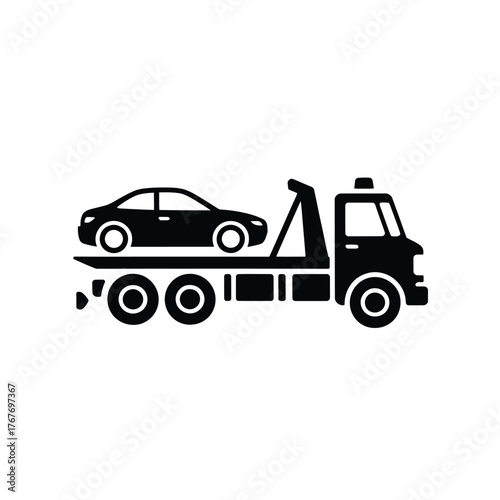 Black silhouette of a tow truck carrying a car on its flatbed