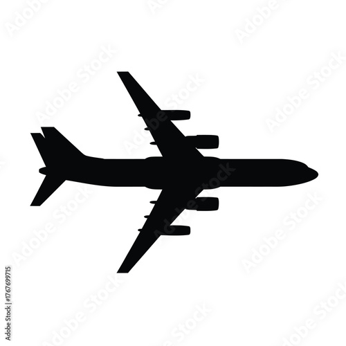 Silhouette of a large commercial jet airplane viewed from directly above