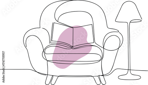 Cozy armchair with book and lamp reading interior