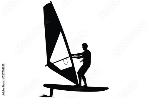 Silhouette of a windsurfer on a board with a sail