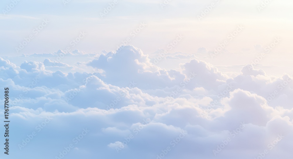 Fototapeta premium Fluffy white clouds in soft blue sky with gentle sunlight