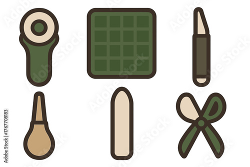 Assortment of sewing and tailoring supplies with rotary cutter mat and scissors