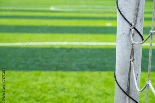soccer goal on a grass soccer field at horizontal composition