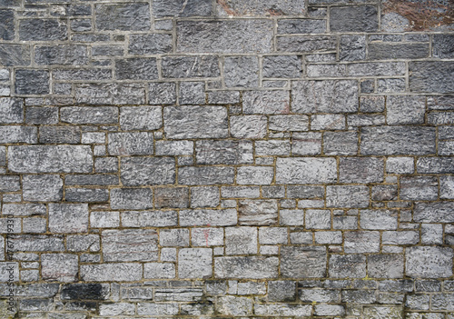 Old grey stone concrete wall
