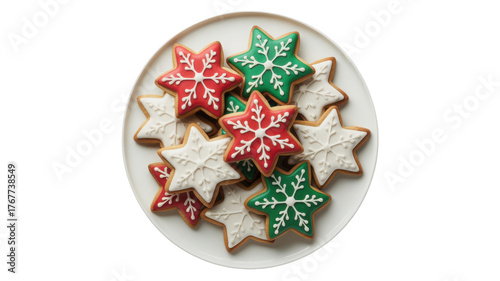 Christmas overhead shot of star shaped christmas cookies on a white plate isolated on transparent background red, green, and white iced cookies