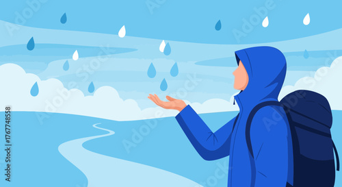 Adventurer Experiences Rain in a Natural Landscape During Rainy Weather While Outdoors