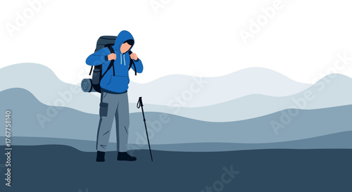 Adventurous Hiker Explores Mountainous Range Under Serene Cold Sky