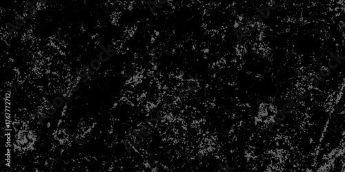 Black and white grunge cracked earth desert texture. a rough, old cracked concrete wall surface with a grunge distressed background texture. old damage and dirty overlay texture with grunge effect.