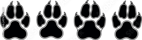 A stylized collection of four distinct black and white animal paw prints, perfect for conveying themes of wildlife, outdoor adventure, pet companionship, or tracking journeys in nature