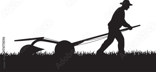 Silhouette of a man plowing a field with a hand plow on grass farmer