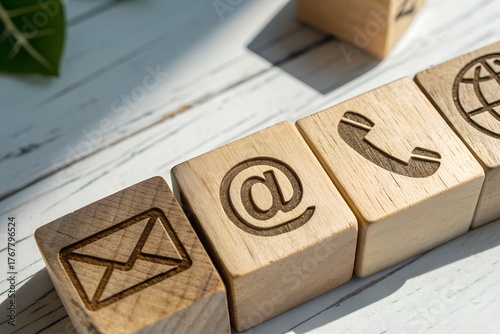 contact us icon email, address, phone, on wood cube, customer service and support for self quarantine business working at home, Telecommuting, Teleworking.