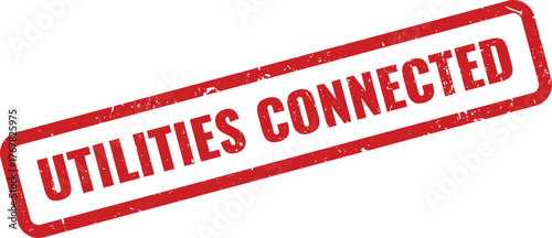Distressed red rubber stamp effect confirming Utilities Connected text for property readiness and active services
