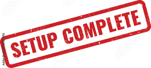 Official red grunge setup complete notification stamp mark for process finalization