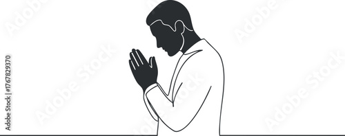 A silhouette of a man in a prayerful pose, symbolizing meditation and spirituality.