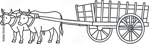 Two oxen pulling a wooden cart in a rural agricultural setting.