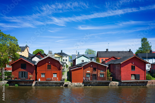 View of red warehouses in Porvoo from the river side, Finland