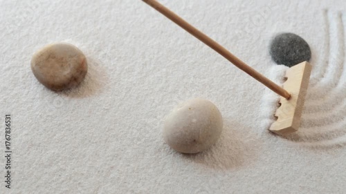 Making zen garden from white sand and stones