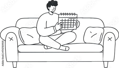 A man sitting on a couch with a calendar, planning his schedule at home.