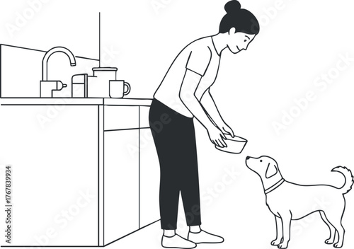 A woman feeding her dog in a modern kitchen, showcasing a caring pet-owner relationship.