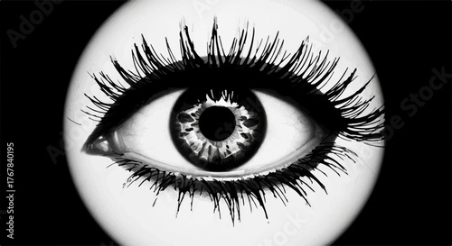 Close-up of a dramatic, wide-open human eye with long lashes against a dark background.