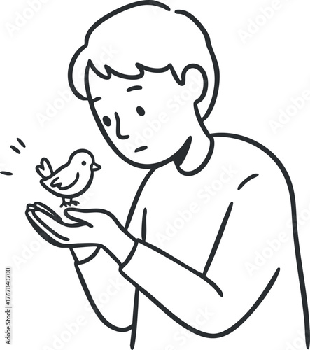 A person gently holds a small bird in their hands, showcasing a moment of connection and care.