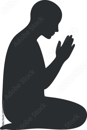 A silhouette of a person praying in a meditative pose symbolizing peace and spirituality.