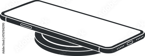 A sleek smartphone placed on a wireless charging pad showcasing modern technology and convenience.