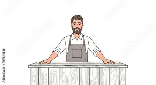 Friendly bearded man wearing an apron standing behind a wooden counter.